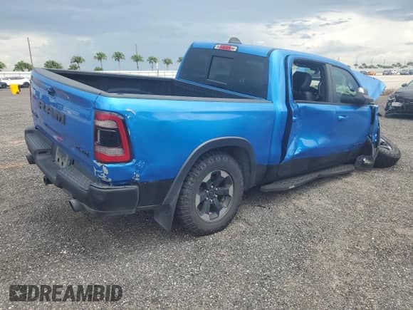 2020 Ram 1500 Rebel z VIN 1C6SRFLT4LN317415, wystawiony jako Copart lot #67455185 z przebiegiem 58 773 mil mil oraz Nie do naprawy • Non repairable. Historia ofert i sprzedaży dostępna na DreamBid. Obrazek 3.