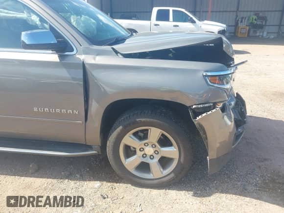 2017 Chevrolet Suburban Premier with VIN 1GNSCJKC5HR309457, listed as a IAAI auction lot 42666197 with 99,932 mi miles and . Bid and sale history available at DreamBid. Image 17.