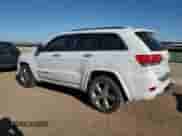 2016 Jeep Grand Cherokee Overland with VIN 1C4RJFCG4GC330314, listed as a Copart auction lot 84763365 with 155,992 mi miles and Salvage title. Bid and sale history available at DreamBid. Image 2.