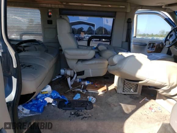 2002 Chevrolet Express с VIN 1GBFG15R521147807, выставлен на аукционе Copart как лот 77610514 с пробегом Не указан миль и Списание • Salvage title. История ставок и продаж доступна на DreamBid. Изображение 11.