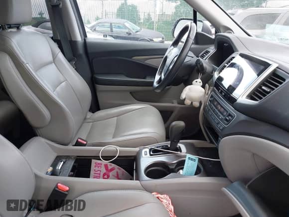 2017 Honda Pilot EX-L with VIN 5FNYF6H79HB028575, listed as a IAAI auction lot 42726028 with 76,494 mi miles and . Bid and sale history available at DreamBid. Image 14.