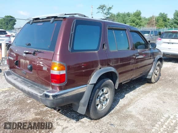 1997 Nissan Pathfinder XE with VIN JN8AR05Y1VW159739, listed as a IAAI auction lot 42836827 with 182,484 mi miles and . Bid and sale history available at DreamBid. Image 4.