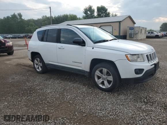 2011 Jeep Compass с VIN 1J4NT1FA5BD290521, выставлен на аукционе Copart как лот 68497485 с пробегом 124 082 миль миль и Списание • Salvage title. История ставок и продаж доступна на DreamBid. Изображение 4.