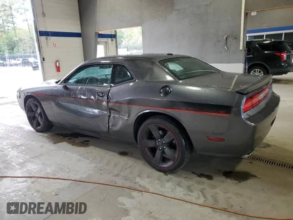 2013 Dodge Challenger R/T z VIN 2C3CDYBTXDH667994, wystawiony jako Copart lot #80292785 z przebiegiem 103 977 mil mil oraz Szkoda całkowita • Salvage title. Historia ofert i sprzedaży dostępna na DreamBid. Obrazek 2.