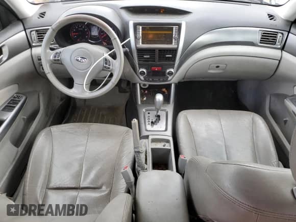 2011 Subaru Forester z VIN JF2SHBHC7BH719649, wystawiony jako Copart lot #57782065 z przebiegiem 241 157 mil mil oraz Szkoda całkowita • Salvage title. Historia ofert i sprzedaży dostępna na DreamBid. Obrazek 8.