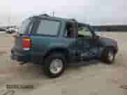 1995 Ford Explorer with VIN 1FMCU22X3SUA67495, listed as a Copart auction lot 44545485 with 180,711 mi miles and Salvage title. Bid and sale history available at DreamBid. Image 3.