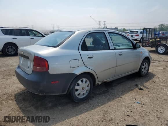 2004 Chevrolet Aveo LS z VIN KL1TJ526X4B142799, wystawiony jako Copart lot #59663475 z przebiegiem 185 731 mil mil oraz Szkoda całkowita • Salvage title. Historia ofert i sprzedaży dostępna na DreamBid. Obrazek 3.