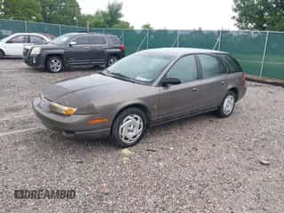 2000 Saturn SW with VIN 1G8ZJ8274YZ132063, listed as a IAAI auction lot 42453187 with 140,166 mi miles and . Bid and sale history available at DreamBid. Image 2.