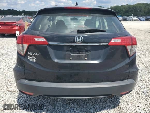 2020 Honda HR-V LX z VIN 3CZRU5H31LM705411, wystawiony jako Copart lot #66599735 z przebiegiem 98 791 mil mil oraz Szkoda całkowita • Salvage title. Historia ofert i sprzedaży dostępna na DreamBid. Obrazek 6.