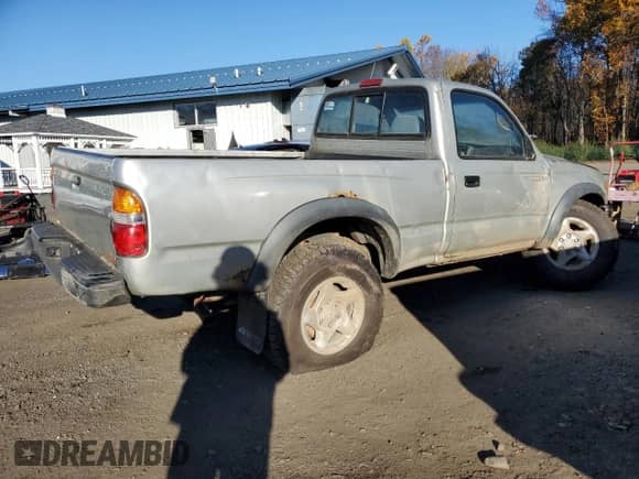 2001 Toyota Tacoma with VIN 5TEPM62N91Z780824, listed as a Copart auction lot 90220975 with 211,375 mi miles and Clean title. Bid and sale history available at DreamBid. Image 3.