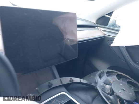 2023 Tesla Model Y Long Range with VIN 7SAYGAEE1PF914992, listed as a IAAI auction lot 43515980 with 5,543 mi miles and . Bid and sale history available at DreamBid. Image 14.