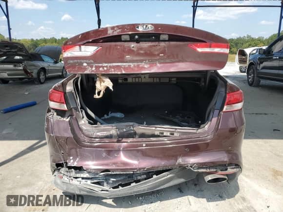 2018 Kia Optima LX с VIN 5XXGT4L31JG254111, выставлен на аукционе Copart как лот 80557865 с пробегом 99 031 миль миль и Списание • Salvage title. История ставок и продаж доступна на DreamBid. Изображение 6.