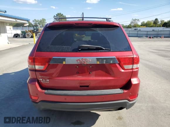 2011 Jeep Grand Cherokee Laredo с VIN 1J4RR4GG0BC527426, выставлен на аукционе Copart как лот 80674025 с пробегом 165 778 миль миль и Списание • Salvage title. История ставок и продаж доступна на DreamBid. Изображение 6.
