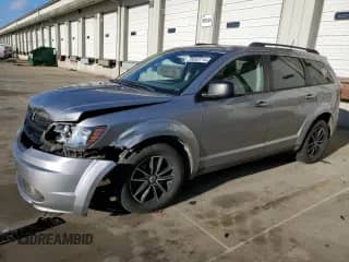 2018 Dodge Journey SE with VIN 3C4PDCABXJT473977, listed as a Copart auction lot 78653714 with 150,538 mi miles and Salvage title. Bid and sale history available at DreamBid. Image 1.