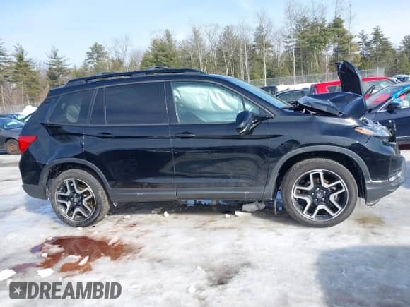 2022 Honda Passport Elite with VIN 5FNYF8H02NB001258, listed as a IAAI auction lot 41631521 with 68,978 mi miles and . Bid and sale history available at DreamBid. Image 13.