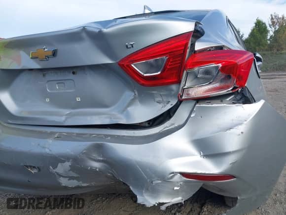 2017 Chevrolet Cruze LT with VIN 1G1BE5SM1H7176784, listed as a IAAI auction lot 43238094 with 70,340 mi miles and . Bid and sale history available at DreamBid. Image 6.