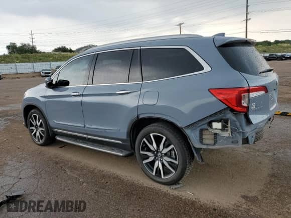 2022 Honda Pilot Touring 7-Passenger with VIN 5FNYF6H60NB042061, listed as a Copart auction lot 64795315 with 49,460 mi miles and Salvage title. Bid and sale history available at DreamBid. Image 2.