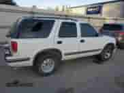 1999 Chevrolet Blazer LS z VIN 1GNCS13W1X2162495, wystawiony jako Copart lot #80019274 z przebiegiem Nie podano mil oraz Szkoda całkowita • Salvage title. Historia ofert i sprzedaży dostępna na DreamBid. Obrazek 3.