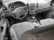 2012 Hyundai Santa Fe SE с VIN 5XYZHDAG0CG167699, выставлен на аукционе Copart как лот 63489204 с пробегом 87 528 миль миль и Списание • Salvage title. История ставок и продаж доступна на DreamBid. Изображение 8.