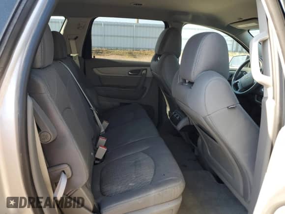 2016 Chevrolet Traverse LS z VIN 1GNKVFED1GJ310663, wystawiony jako Copart lot #68890295 z przebiegiem 87 884 mil mil oraz Szkoda całkowita • Salvage title. Historia ofert i sprzedaży dostępna na DreamBid. Obrazek 11.
