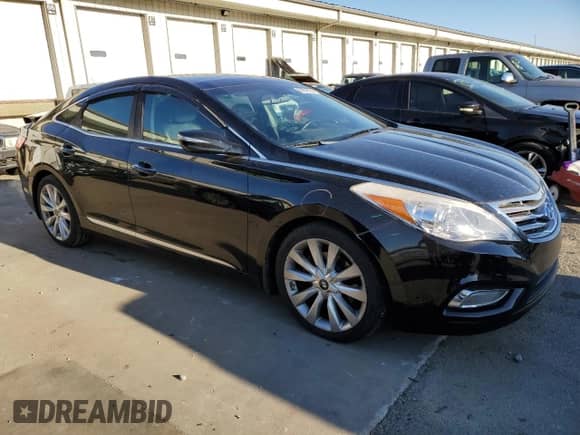 2013 Hyundai Azera с VIN KMHFH4JG2DA204770, выставлен на аукционе Copart как лот 82849384 с пробегом 88 246 миль миль и Списание • Salvage title. История ставок и продаж доступна на DreamBid. Изображение 4.