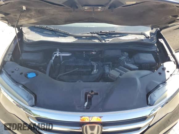 2016 Honda Pilot Elite с VIN 5FNYF6H00GB037005, выставлен на аукционе Copart как лот 69608935 с пробегом Не указан миль и Списание • Salvage title. История ставок и продаж доступна на DreamBid. Изображение 12.