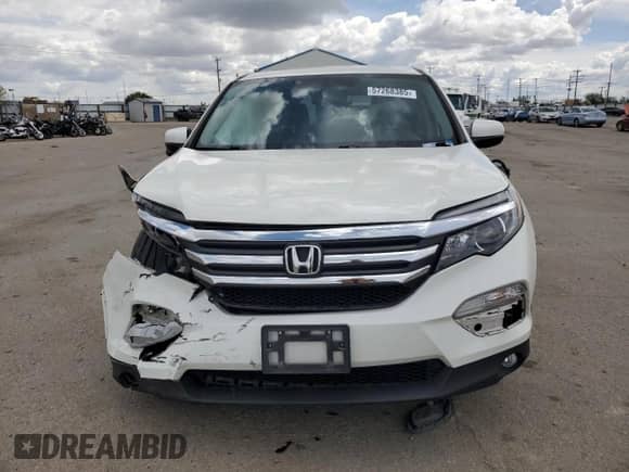 2018 Honda Pilot EX-L with VIN 5FNYF6H75JB060588, listed as a Copart auction lot 57268385 with 67,373 mi miles and Salvage title. Bid and sale history available at DreamBid. Image 5.