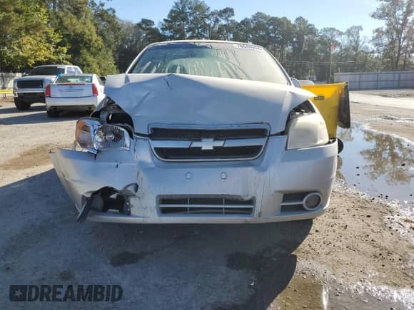 2011 Chevrolet Aveo 2LT z VIN KL1TG5DE6BB167456, wystawiony jako Copart lot #76548994 z przebiegiem 140 019 mil mil oraz Szkoda całkowita • Salvage title. Historia ofert i sprzedaży dostępna na DreamBid. Obrazek 5.