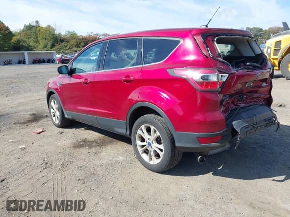 2017 Ford Escape SE with VIN 1FMCU9G9XHUB55584, listed as a IAAI auction lot 43377373 with 106,045 mi miles and . Bid and sale history available at DreamBid. Image 3.