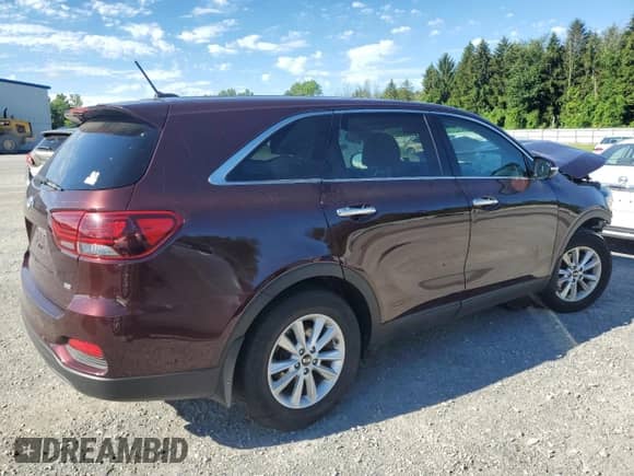 2019 Kia Sorento L with VIN 5XYPG4A34KG571093, listed as a Copart auction lot 65255445 with 113,894 mi miles and Salvage title. Bid and sale history available at DreamBid. Image 3.