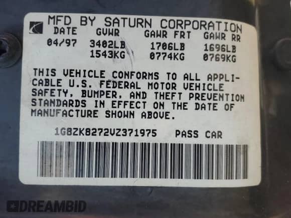 1997 Saturn SW with VIN 1G8ZK8272VZ371975, listed as a Copart auction lot 75880424 with 121,194 mi miles and Salvage title. Bid and sale history available at DreamBid. Image 12.