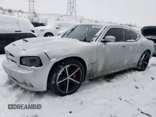 2008 Dodge Charger SRT-8 с VIN 2B3LA73W68H198045, выставлен на аукционе Copart как лот 41621975 с пробегом 215 475 миль миль и Списание • Salvage title. История ставок и продаж доступна на DreamBid. Изображение 1.