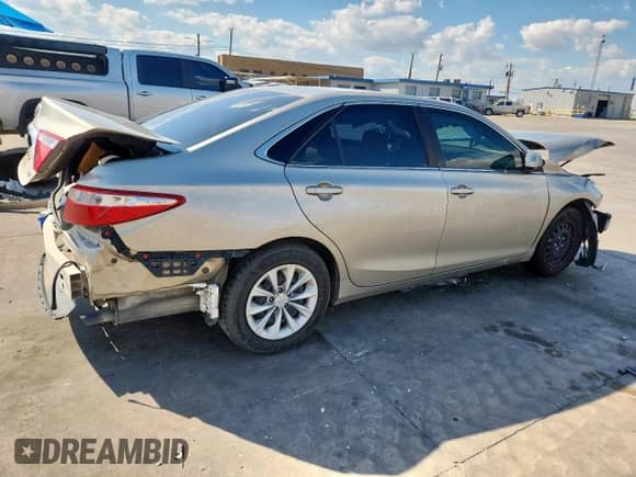 2016 Toyota Camry LE с VIN 4T4BF1FK0GR566461, выставлен на аукционе Copart как лот 81821365 с пробегом 86 113 миль миль и Списание • Salvage title. История ставок и продаж доступна на DreamBid. Изображение 3.