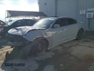 2020 Dodge Charger Scat Pack с VIN 2C3CDXGJ5LH244367, выставлен на аукционе Copart как лот 81485415 с пробегом 69 044 миль миль и Списание • Salvage title. История ставок и продаж доступна на DreamBid. Изображение 1.