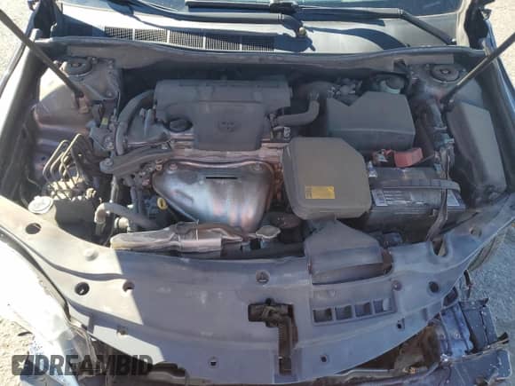 2015 Toyota Camry LE z VIN 4T4BF1FK6FR451815, wystawiony jako Copart lot #82371635 z przebiegiem Nie podano mil oraz Szkoda całkowita • Salvage title. Historia ofert i sprzedaży dostępna na DreamBid. Obrazek 11.