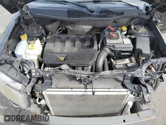 2014 Jeep Compass Latitude with VIN 1C4NJCEB1ED522330, listed as a Copart auction lot 84630415 with 150,480 mi miles and Salvage title. Bid and sale history available at DreamBid. Image 12.