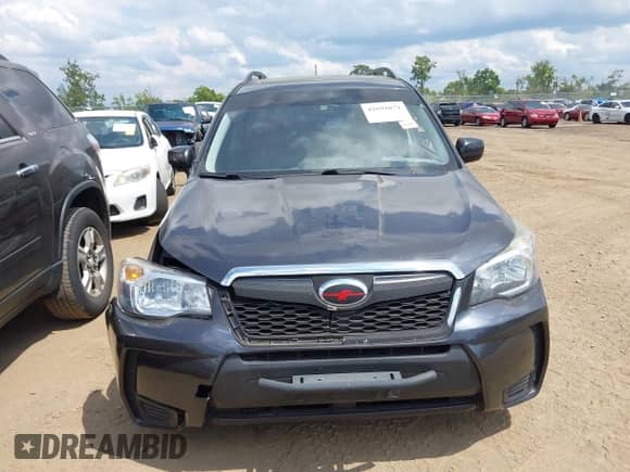 2015 Subaru Forester XT Premium z VIN JF2SJGDCXFH552071, wystawiony jako IAAI lot #42892071 z przebiegiem 116 909 mil mil oraz . Historia ofert i sprzedaży dostępna na DreamBid. Obrazek 13.