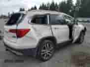 2018 Honda Pilot Touring с VIN 5FNYF6H91JB018033, выставлен на аукционе Copart как лот 70367585 с пробегом Не указан миль и Списание • Salvage title. История ставок и продаж доступна на DreamBid. Изображение 3.