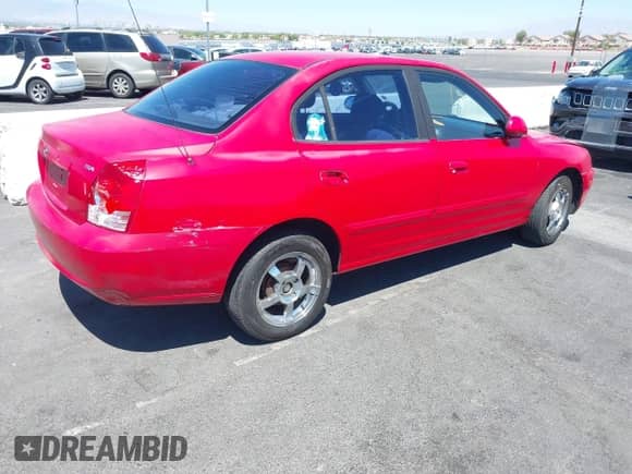 2004 Hyundai Elantra GLS with VIN KMHDN46D74U804312, listed as a IAAI auction lot 42835075 with 201,828 mi miles and . Bid and sale history available at DreamBid. Image 4.