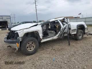 2002 Chevrolet Silverado 2500HD LS с VIN 1GCHK23G82F218155, выставлен на аукционе Copart как лот 65032015 с пробегом Не указан миль и Списание • Salvage title. История ставок и продаж доступна на DreamBid. Изображение 1.