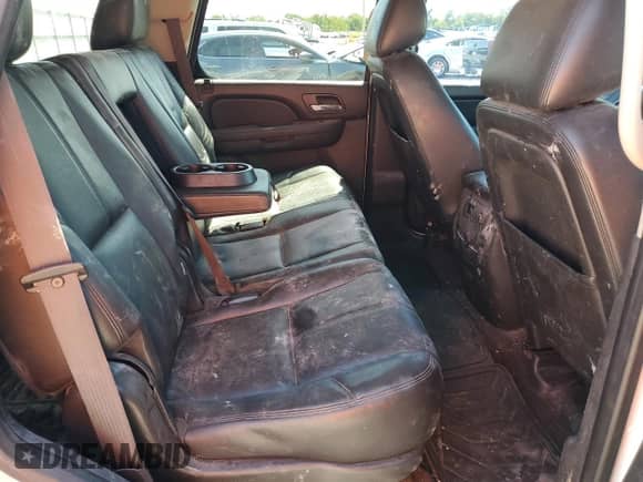 2013 Chevrolet Tahoe LT z VIN 1GNSKBE05DR250513, wystawiony jako Copart lot #71585735 z przebiegiem 199 451 mil mil oraz Szkoda całkowita • Salvage title. Historia ofert i sprzedaży dostępna na DreamBid. Obrazek 11.