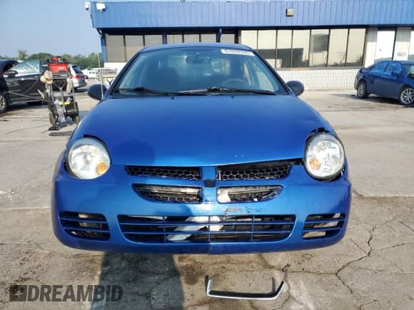 2004 Dodge Neon SXT with VIN 1B3ES56CX4D645799, listed as a Copart auction lot 67028335 with 176,412 mi miles and Salvage title. Bid and sale history available at DreamBid. Image 5.
