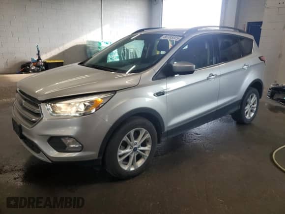 2017 Ford Escape SE z VIN 1FMCU9G91HUE87820, wystawiony jako Copart lot #80785325 z przebiegiem 118 426 mil mil oraz Szkoda całkowita • Salvage title. Historia ofert i sprzedaży dostępna na DreamBid. Obrazek 1.