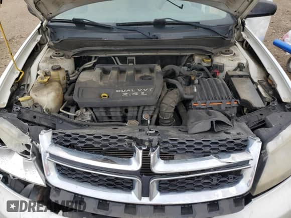 2012 Dodge Avenger SE z VIN 1C3CDZAB6CN147411, wystawiony jako Copart lot #81712965 z przebiegiem 214 093 mil mil oraz Szkoda całkowita • Salvage title. Historia ofert i sprzedaży dostępna na DreamBid. Obrazek 11.