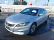 2012 Honda Accord LX-S with VIN 1HGCS1B30CA005235, listed as a IAAI auction lot 43363677 with 147,204 mi miles and . Bid and sale history available at DreamBid. Image 2.