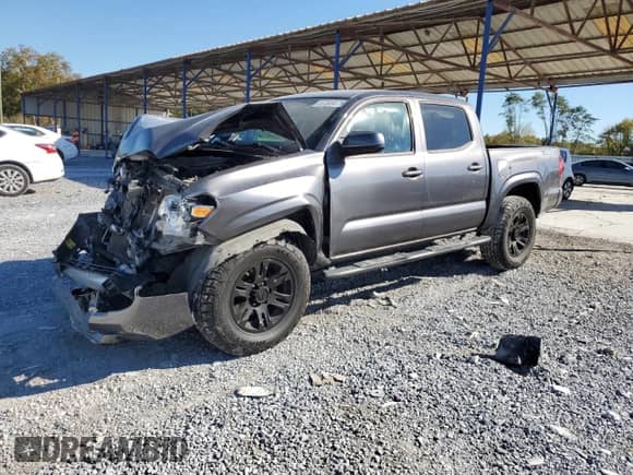 2021 Toyota Tacoma SR с VIN 5TFCZ5AN9MX274126, выставлен на аукционе Copart как лот 87295075 с пробегом 63 596 миль миль и Списание • Salvage title. История ставок и продаж доступна на DreamBid. Изображение 1.