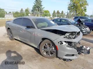2023 Dodge Charger SXT with VIN 2C3CDXJG7PH704485, listed as a IAAI auction lot 43229216 with 18,544 mi miles and . Bid and sale history available at DreamBid. Image 1.