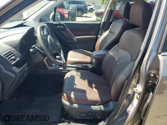 2017 Subaru Forester Touring z VIN JF2SJGWC1HH587274, wystawiony jako Copart lot #68068555 z przebiegiem Nie podano mil oraz Szkoda całkowita • Salvage title. Historia ofert i sprzedaży dostępna na DreamBid. Obrazek 7.