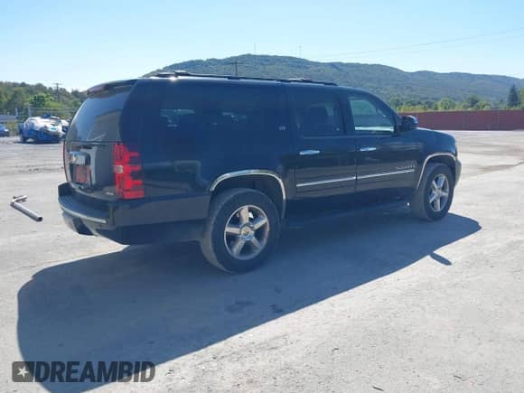 2009 Chevrolet Suburban LTZ z VIN 1GNFK36349R294901, wystawiony jako IAAI lot #43203353 z przebiegiem 187 400 mil mil oraz . Historia ofert i sprzedaży dostępna na DreamBid. Obrazek 4.