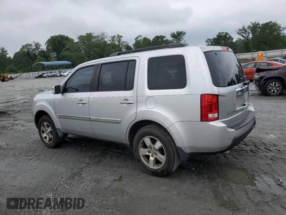 2009 Honda Pilot Touring with VIN 5FNYF38839B027611, listed as a Copart auction lot 67812505 with 148,357 mi miles and Salvage title. Bid and sale history available at DreamBid. Image 2.
